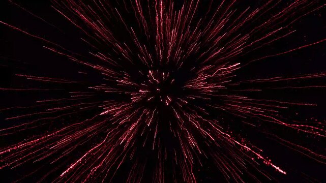 Red sparkle dust burst, with sparkling particle trails and radiant light beams, bursting outwards on a black background for awards night, gala events and premium intro sequences,4k.