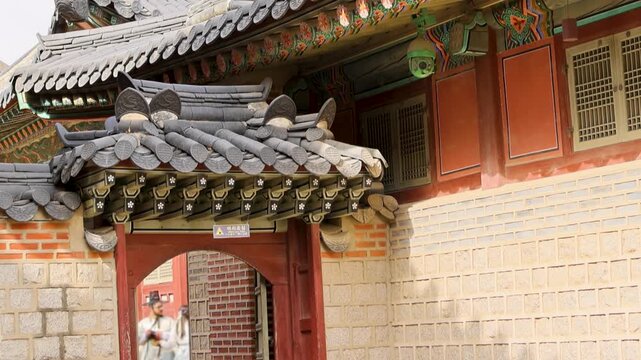 Decorative Asian roof. Elaborate roof design with guardian figures