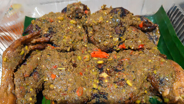 Traditional Balinese Ayam Betutu Roasted Chicken with Rich Spicy Base Gede Seasoning