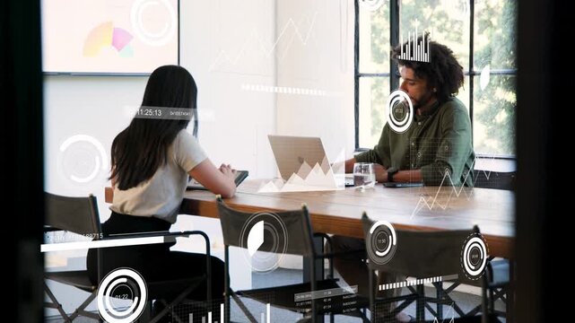 Man tapping laptop and gesturing, laptop tap starting overlays across glass during business review