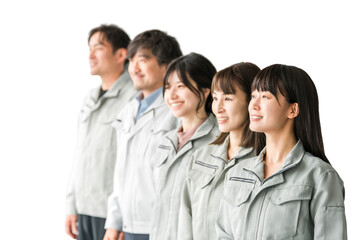Fototapeta premium Male and female staff in the manufacturing, construction, transportation, and building industries wearing work clothes.