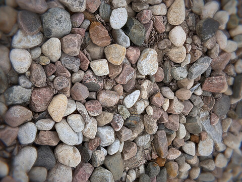 Colourful stones and pebbles on the ground