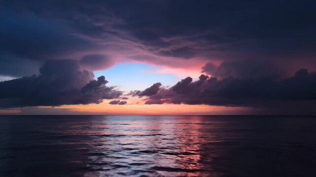 Ocean sunset storm clouds.