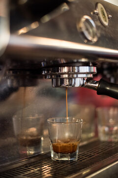 Espresso Pouring out of Machine