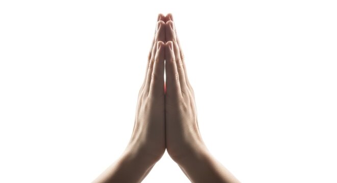 Hands in Prayer Position Against White Background, Symbolizing Faith and Spirituality.