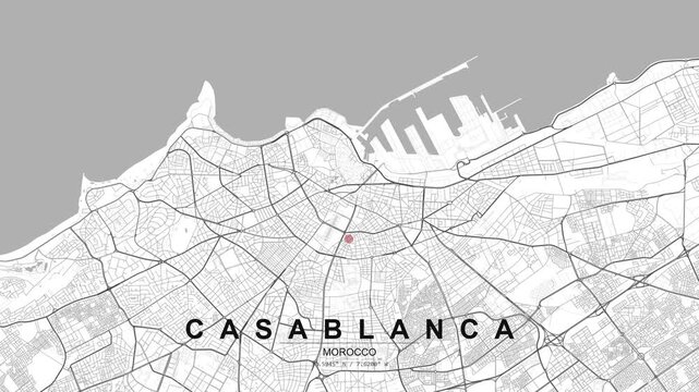 Clean city map of Casablanca, Morocco, featuring coastal outline, connected road network and a red location pin highlighting a central urban position.