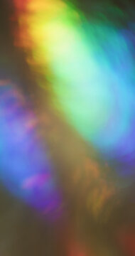Film blur lens. Glowing background. Yellow blue purple illuminated colorful texture. Spectrum leak overlay abstract burn reflection on dark.