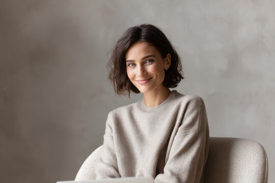 portrait smiling woman sitting in armchair with laptop remote work lifestyle isolated concept