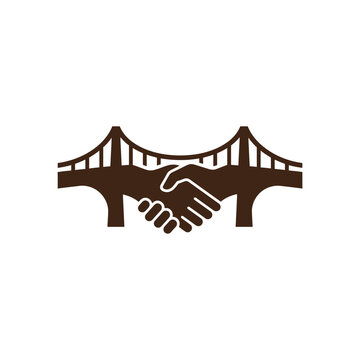 Handshake icon under bridge symbolizes agreement and partnership