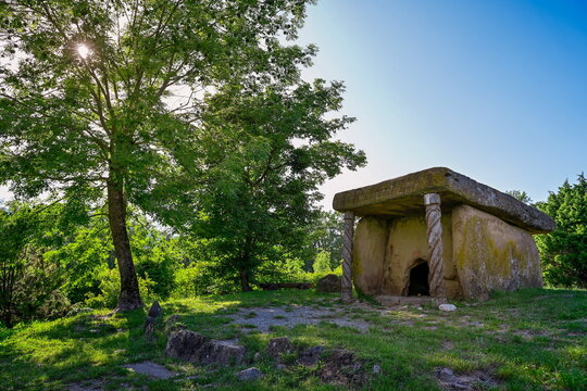 Ancient Adyghe dolmen Tor in the rays of the evening sun, Krasnodar region of Russia