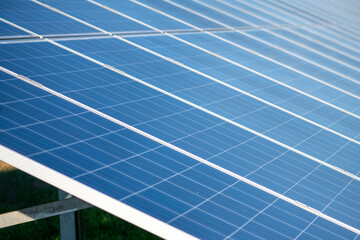 Solar energy panel with texture and lines. Solar renewable system with electric detail. Solar cells closeup with blue surface. Solar eco clean background pattern. © Svitlana