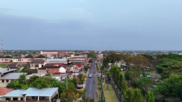 Golden sunrise over Solo Baru skyline, Central Java, Indonesia.
