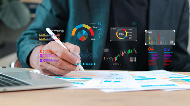 Business analyst reviewing financial reports with digital dashboard, data visualization charts, KPI metrics and analytics. Corporate planning, market growth, fintech strategy and performance