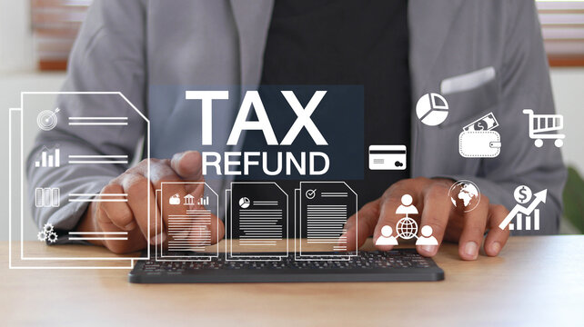 Businessman using laptop with digital tax refund interface, financial documents, charts and payment icons, online filing, accounting technology, finance management and e-filing in modern office 