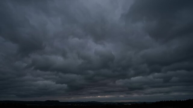 storm clouds over horizon at dusk, moody overcast sky landscape