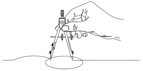 Fototapeta premium A hand holding a metal drafting compass to draw a perfect circle on a plain white paper surface