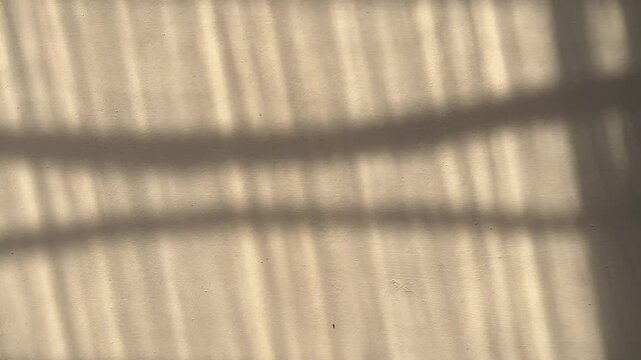beige wall interior background, studio and backdrops show products with shadows. text insertion and presentation product. Black. Dark. Copy space, empty. Beige, yellow. reflected, reflection.