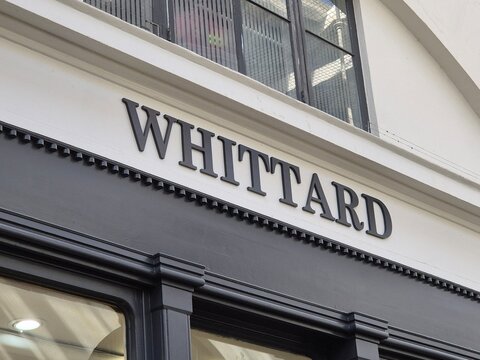 London UK 04.07.2025 Whittard tea brand storefront sign on elegant facade with classic serif lettering showcasing premium british retail identity and traditional style in historic shopping district