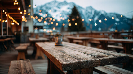 Obraz premium Cozy Mountain Terrace Scene With Tables And Blurred Alpine Landscape
