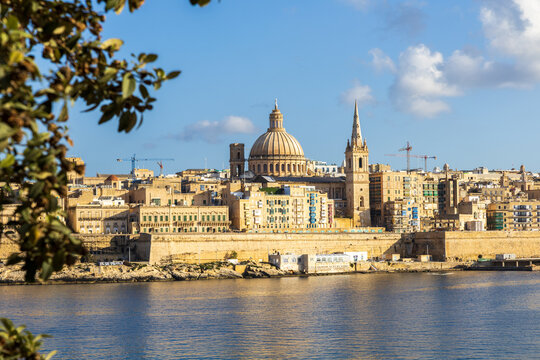 Valletta Skyline with Carmelite Basilica Dome and St Pauls Cathedral Across Marsamxett Harbour Sliema Malta