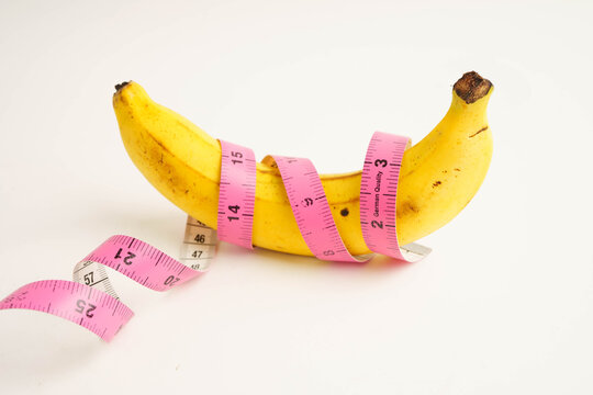 Banana with measuring tape, penis health.