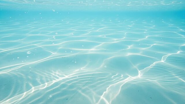 turquoise water surface sunlit ripples undersea light