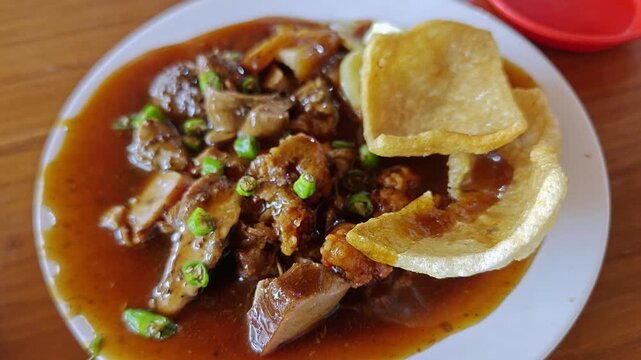 Traditional Syobak Babi Singaraja Balinese Braised Pork with Savory Gravy