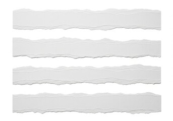 Fototapeta premium A set of four torn paper strips on a white background
