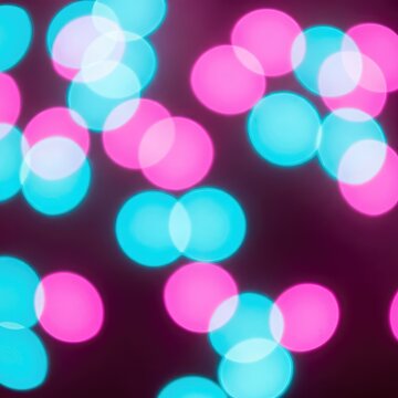 Abstract background of vivid, glowing cyan and magenta light orbs rendered completely out of focus with intense shallow depth of field, effect, depth of field, background