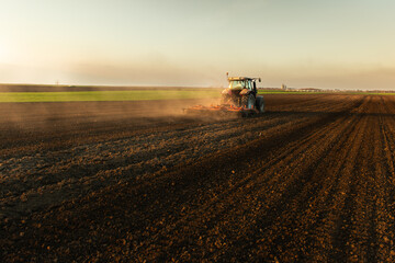 Farmer in tractor preparing land for sowing © Dusan Kostic