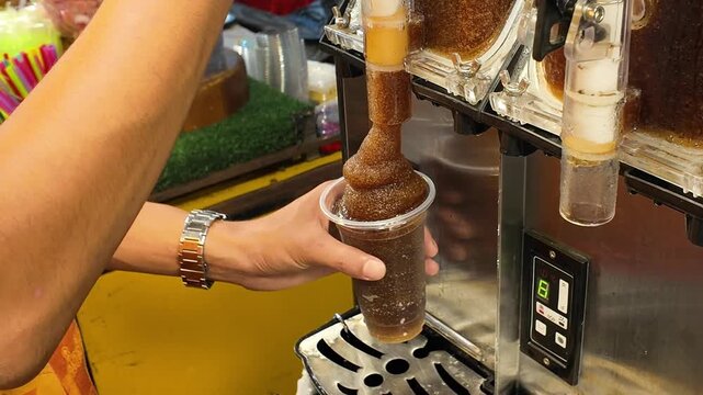 Iced Cola Soft Drink Dispensed from Machine at Thai Street Market 4K