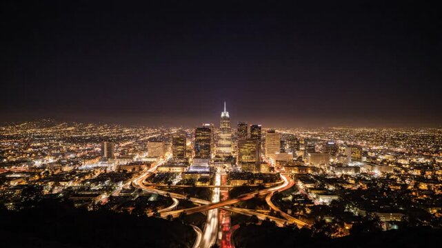 Epic Long Exposure Time Lapse of Los Angeles Skyline at Twilight and Night With Illuminated Highways and Buildings
