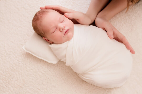 Sleeping newborn baby. Healthy and medical concept. Healthy child, concept of hospital and happy motherhood. Infant baby. Happy pregnancy and childbirth. Children's theme. Baby and childen's goods