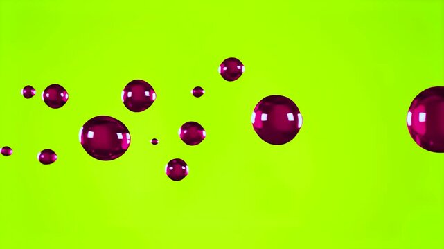 A set of shiny magenta purple 3D spheres floating in space, rendered on a chroma key green background. Designed for effortless keying, colorful particle effects, aesthetic motion design, and backgroun
