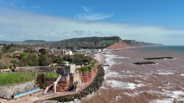 Sidmouth coastal cliffs and town Devon aerial sea with red colour