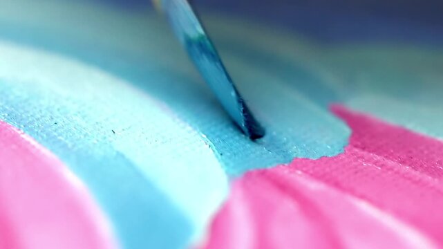 Artist brush creating fine details on artwork soft bokeh authenticity