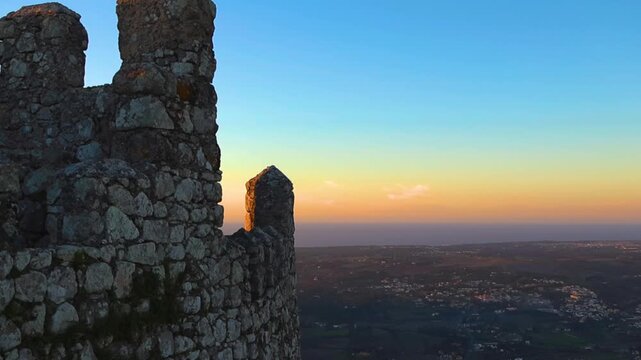 Moorish Castle Battlement Overlooking a Landscape at Sunset in Sintra, Portugal
