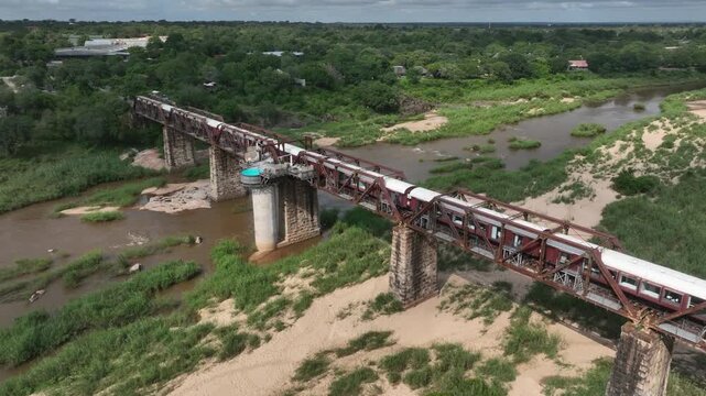Approaching aerial of Kruger Shalati The Train on the Bridge in South Africa.