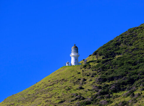 Cape brett lighthouse overlooking bay of islands, new zealand