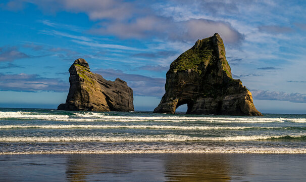 Wharariki beach archway island rock formations, new zealand