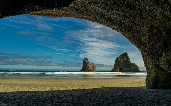 Wharariki beach archway island rock formations vista, new zealand