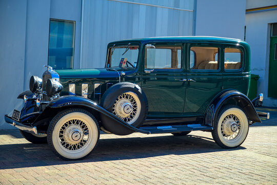Vintage Chevrolet Series BA Confederate stands during art deco festival on napier