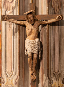 VERCELLI, ITALY - JANUARY 16, 2026: The carved polychrome crucifixion in the church Chiesa di San Cristphoro from 16. cent. 