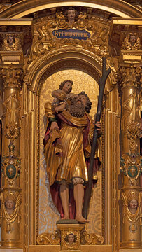Luzern - The carved polychrome side altar of St. Cristopher in the church St. Leodegar im Hof by Niklaus Geisler (1585-1665)