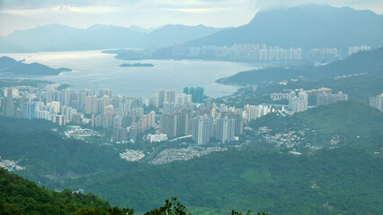 Hong Kong and the city's business district. View of the city and Victoria bay from the hills. © max5128