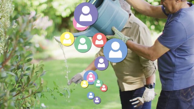 Senior pair tending garden man tilting watering can pouring water making social icons over subjects