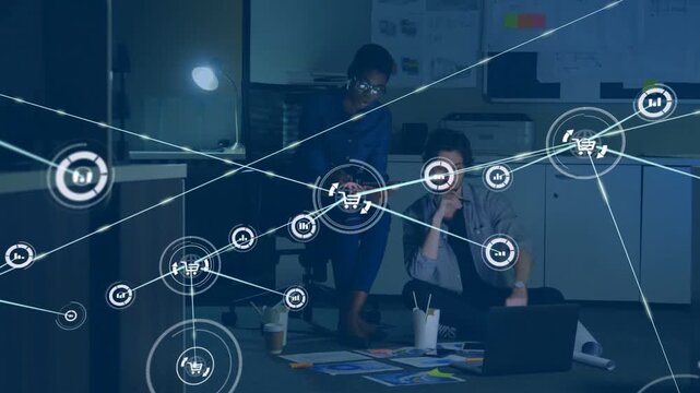 Team working, pointing at laptop with node appearing, growing cart and chart network for business