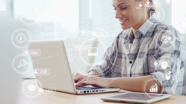 Woman typing on laptop at desk, activating analytics HUD and badges while responding to feedback