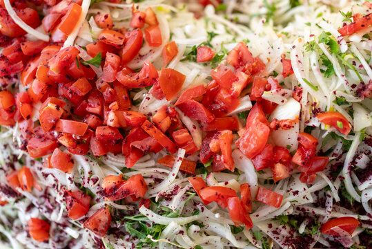 Fresh Mixed Salad with Chopped Tomatoes and Herbs Close-Up