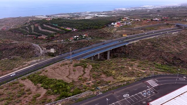 Scenic aerial view of Tenerife highway through rugged landscape